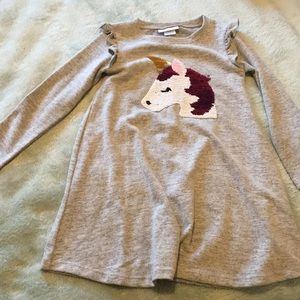 Gray dress with unicorn in the middle long sleeves.